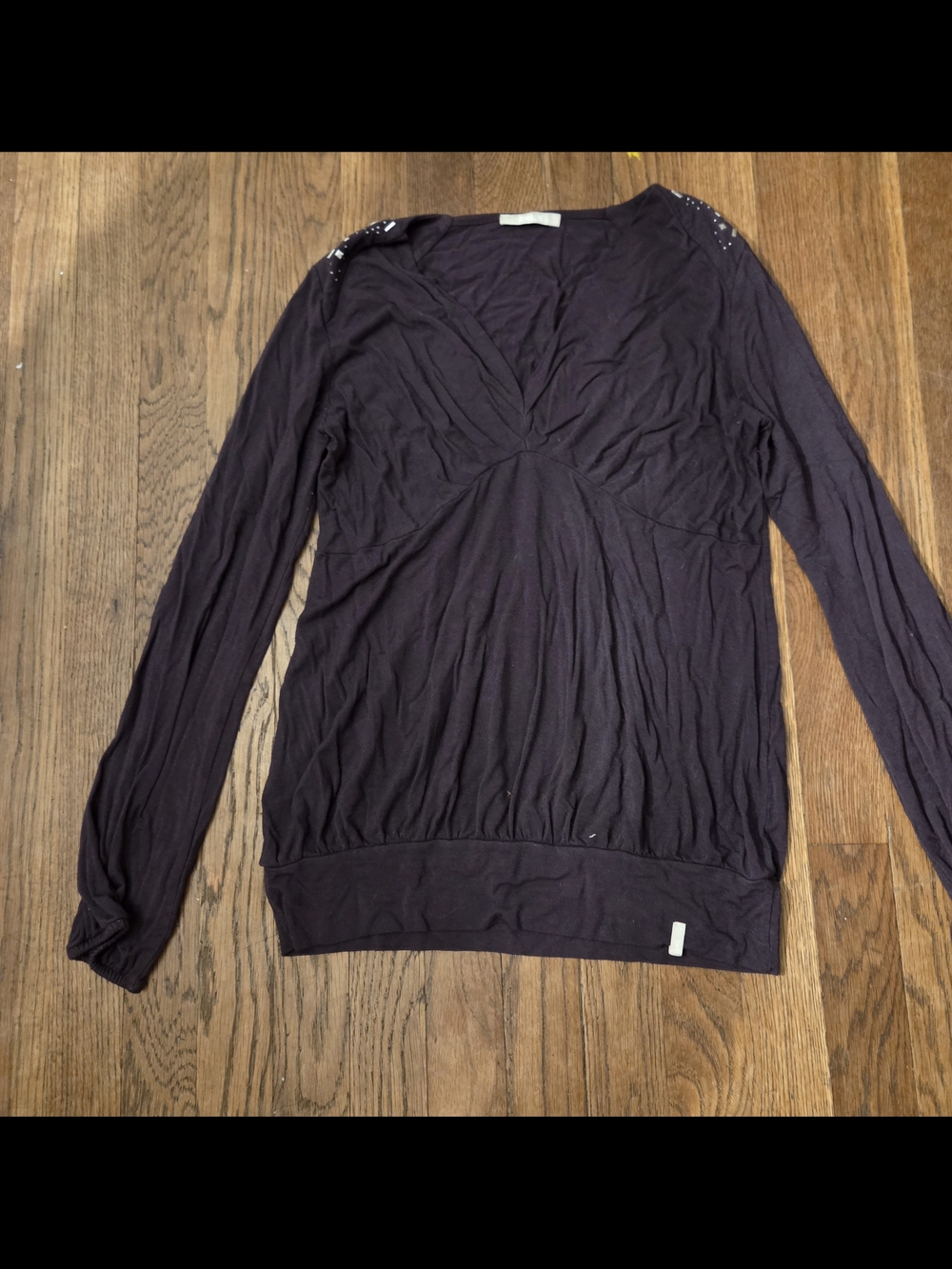 Long-Sleeve Black V-Neck Women's Top with Shoulder Detail